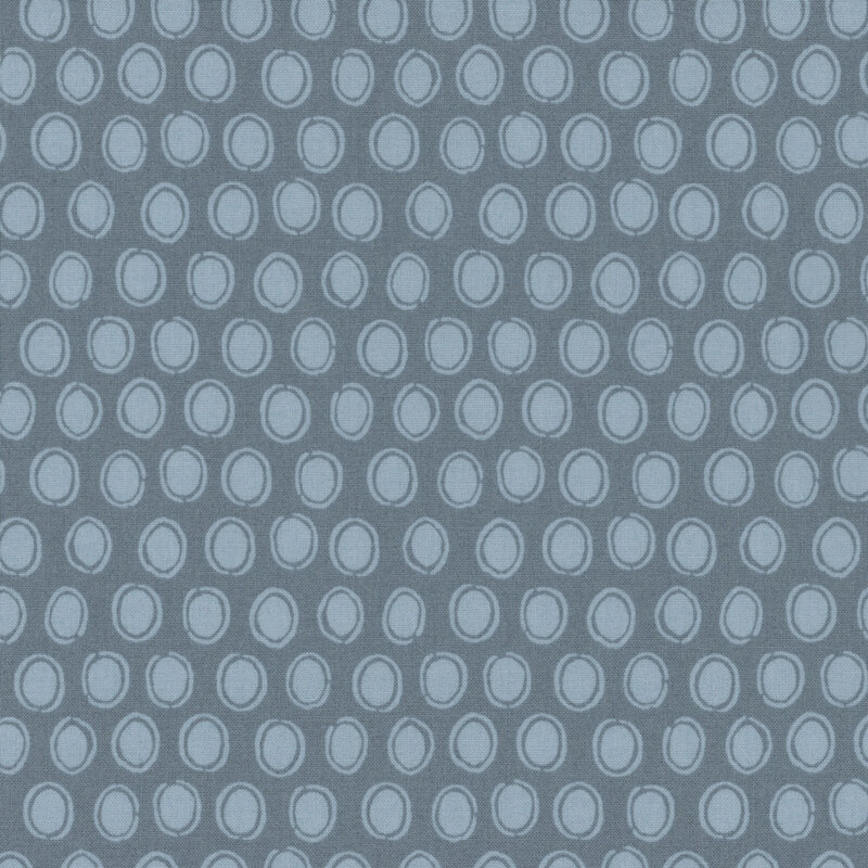 steel blue fabric featuring rows of dutch blue ovals surrounded by sketched circles