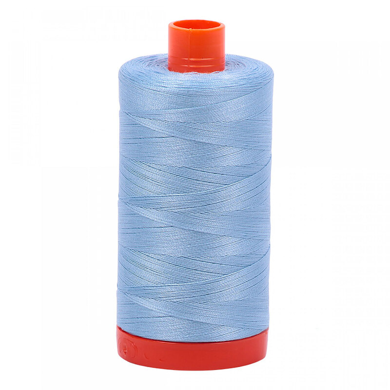 A spool of Aurifil 2715 - Robins Egg thread on a white background