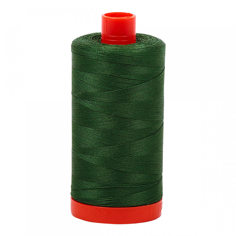 A spool of Aurifil 2892 -Pine thread on a white background