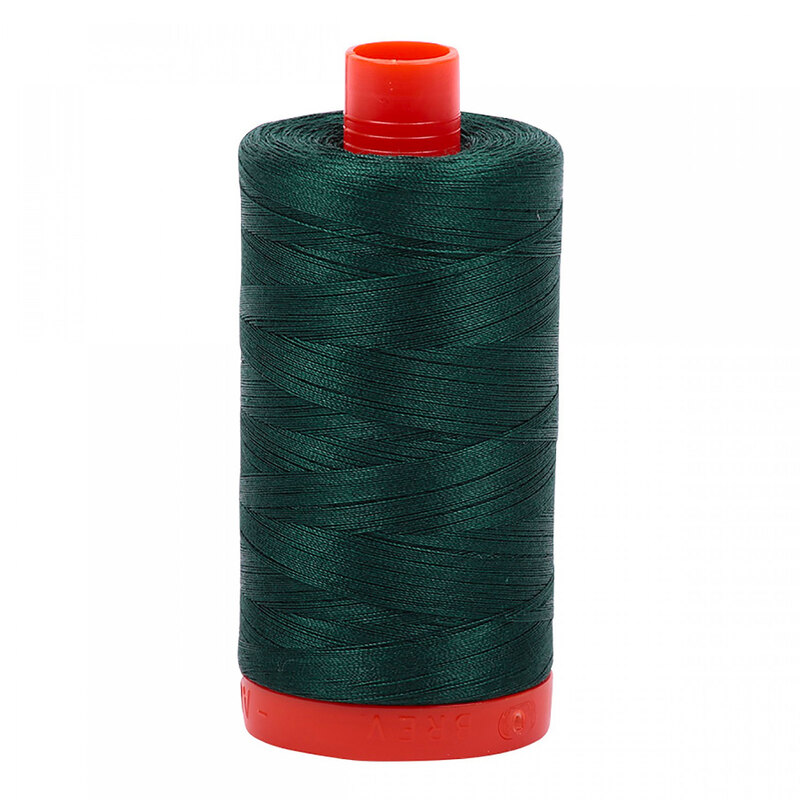 A spool of Aurifil 2885 - Medium Spruce thread on a white background