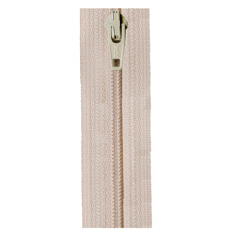 Close-up of a beige zipper with a metal pull tab against a white background.