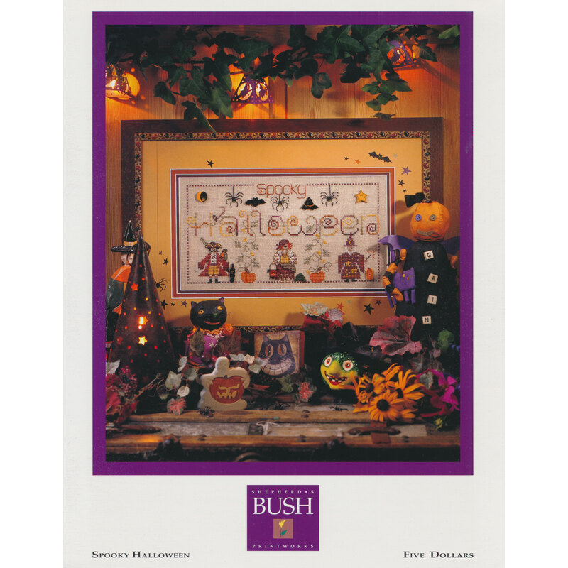 Front of spooky halloween cross stitch pattern showing finish framed project that features three tiny figures