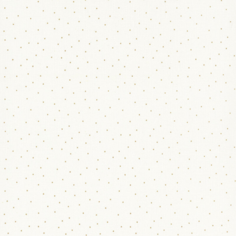 fabric featuring a light cream background with scattered small tan dots