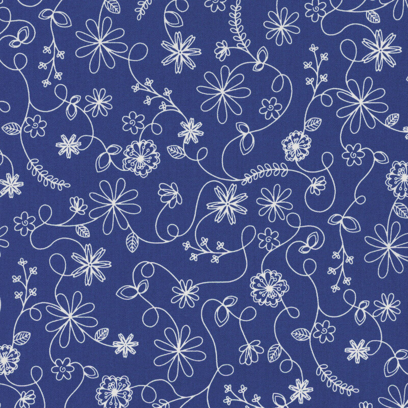 royal blue fabric featuring a swirling vine floral pattern in white