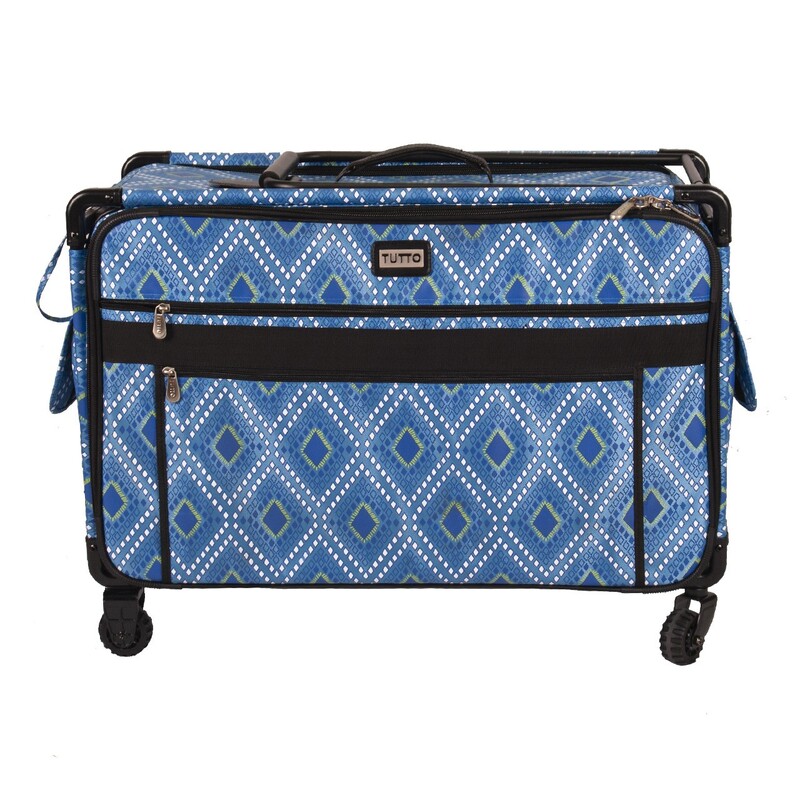 A blue patterned rolling suitcase with a diamond design and black trim, featuring front pockets.