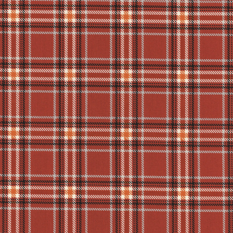 Brick red, black, and orange plaid fabric