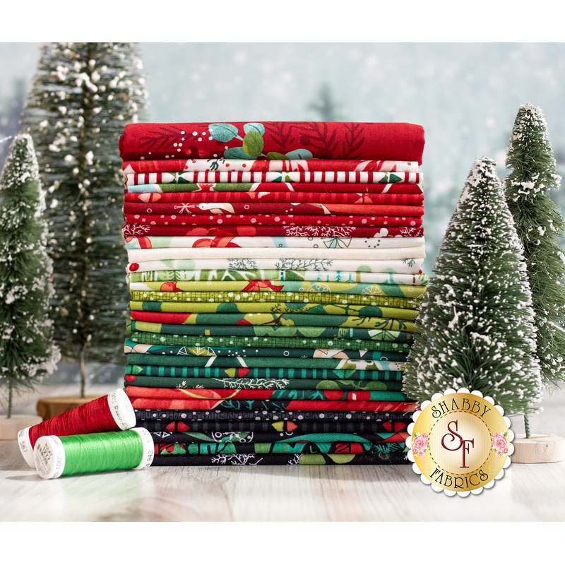 photo of Winterly fabric bundle, in shades of red, green, black, white, and teal, on a white background