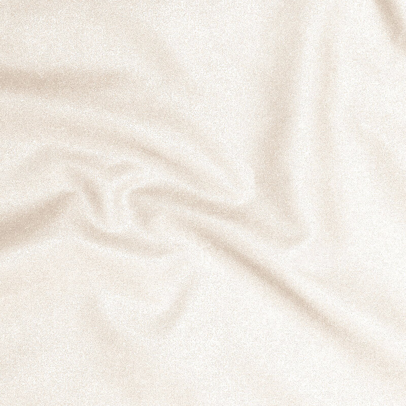 Overhead shot of twisted and draped fabric that showcases the sparkle, sheen, and texture of the fabric.