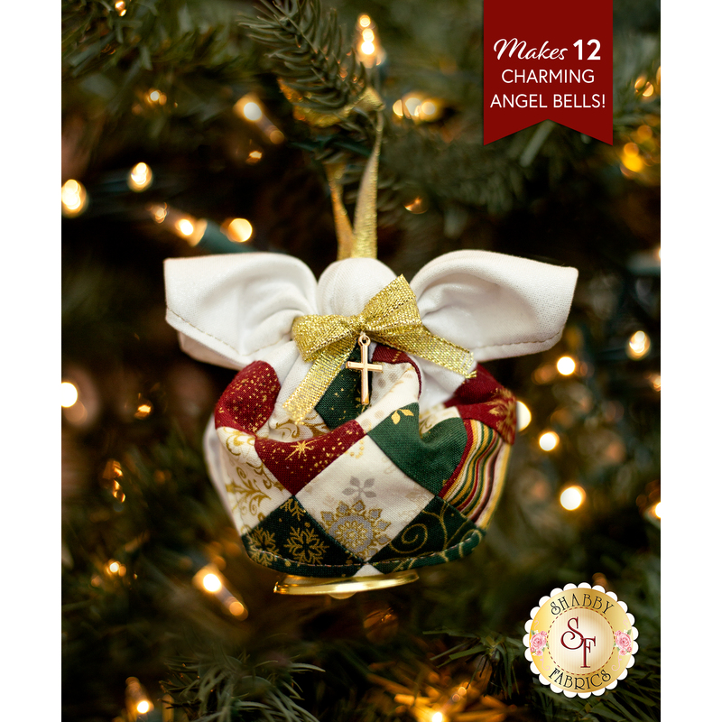 Close up photo of a finished Angel Bell Ornament hanging on a decorated Christmas tree with lights in the background and the words 