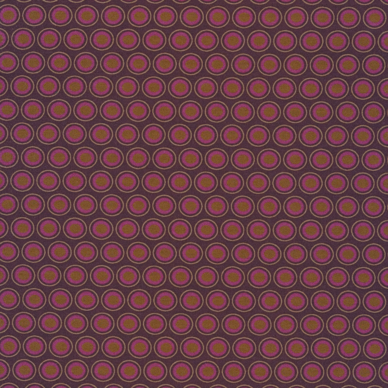 deep plum fabric with a lovely magenta and golden brown oval polka dot design