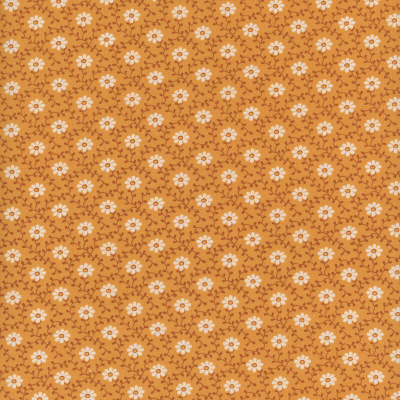 Orange fabric with dark orange vines and cream daisies all over