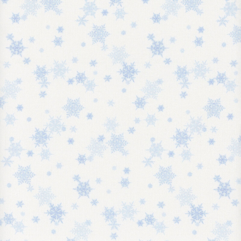 white fabric featuring small scattered light blue snowflakes