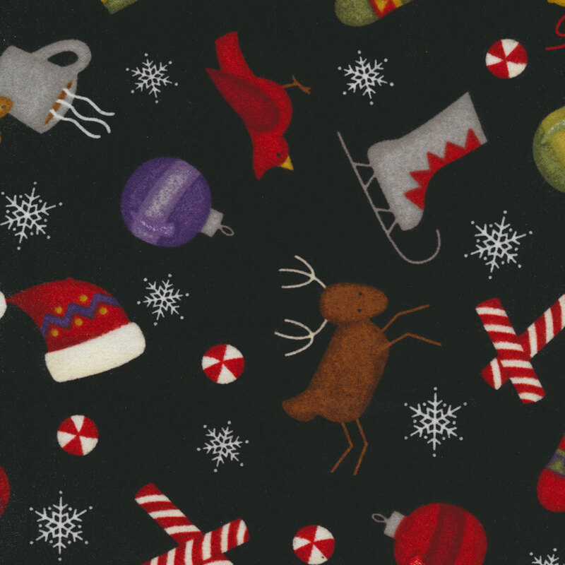Black fabric with stylized reindeer, ice skates, peppermints, snowflakes, and cardinals.