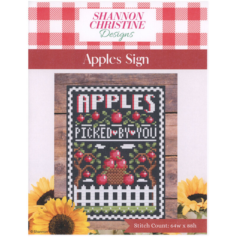 Front of pattern showing a digitized version of the finished project staged on rustic wood paneling with a red gingham header