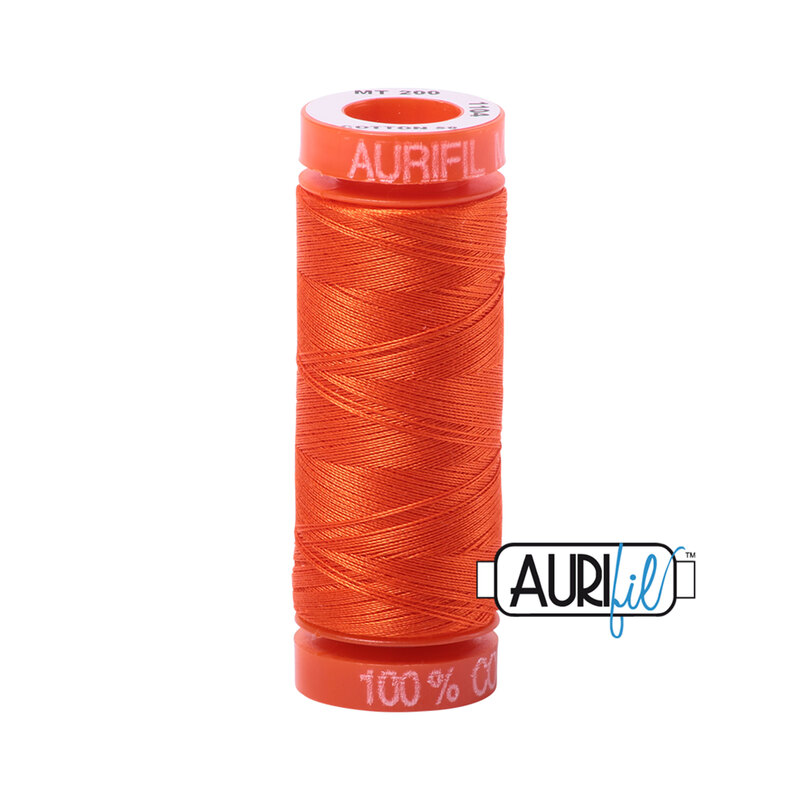 Neon Orange thread on an orange spool, isolated on a white background