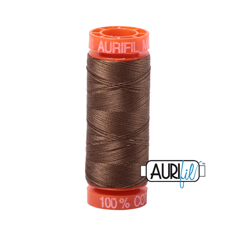 Dark Sandstone thread on an orange spool, isolated on a white background