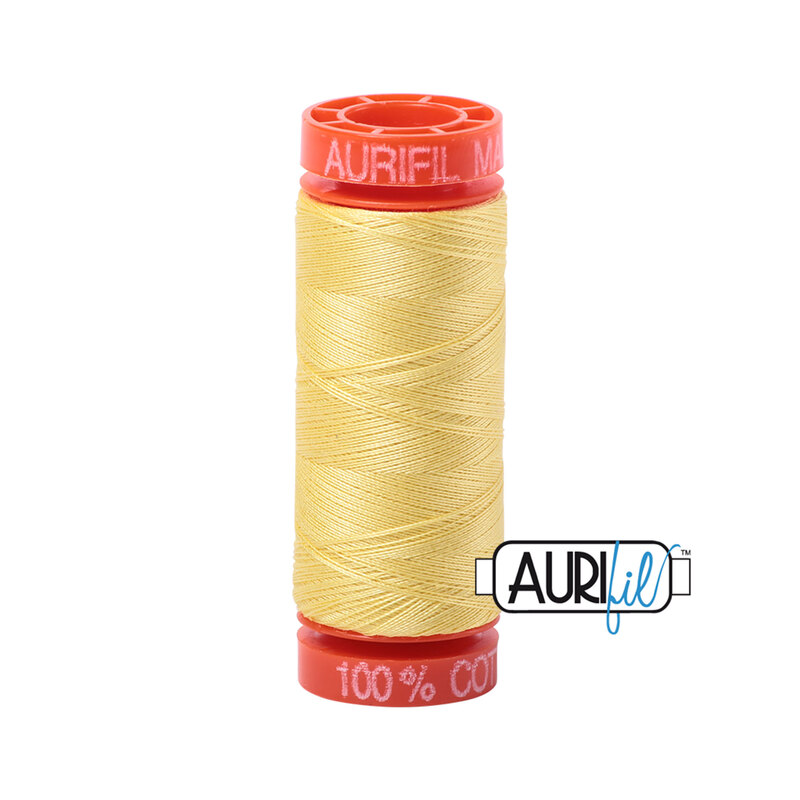 Lemon thread on an orange spool, isolated on a white background