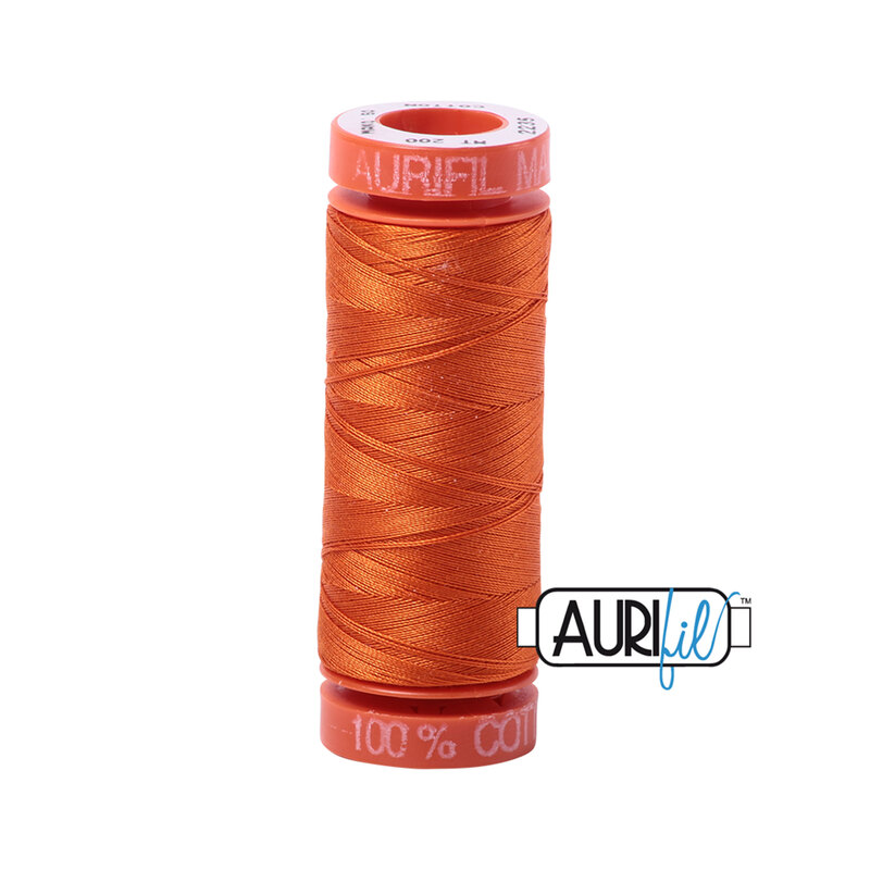 Orange thread on an orange spool, isolated on a white background