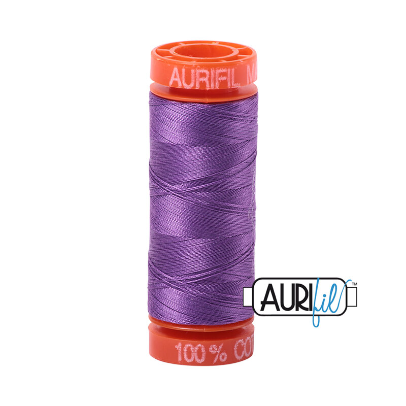 Medium Lavender thread on an orange spool, isolated on a white background