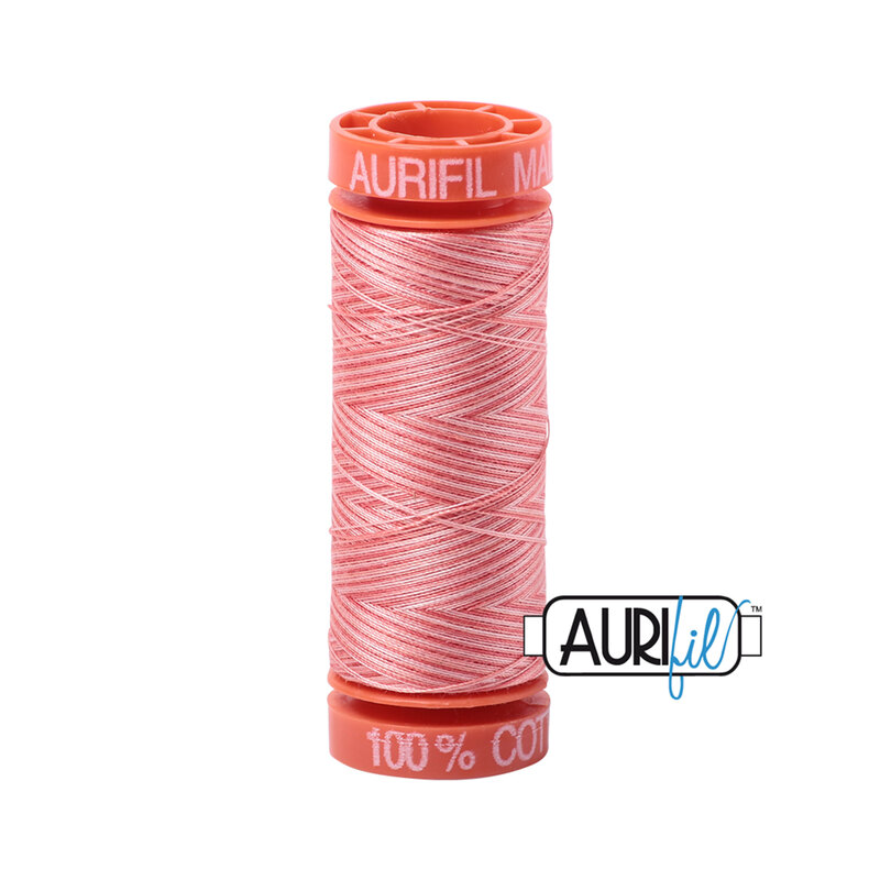 Flamingo thread on an orange spool, isolated on a white background