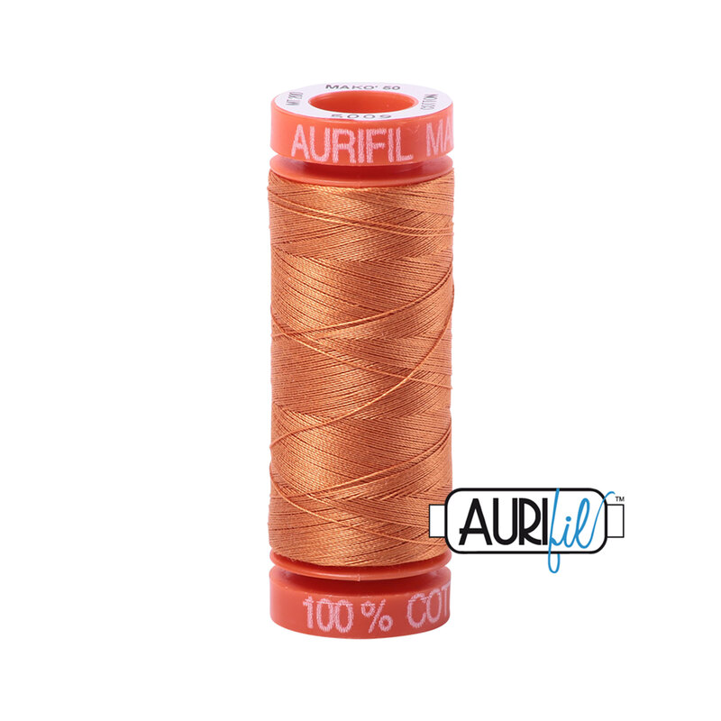 Medium Orange thread on an orange spool, isolated on a white background