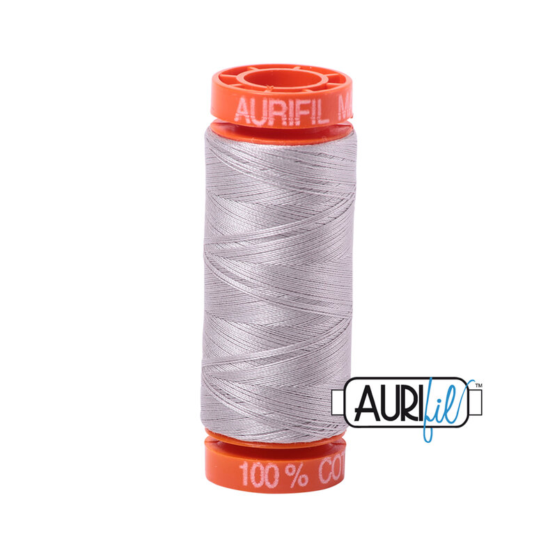 Xanadu thread on an orange spool, isolated on a white background