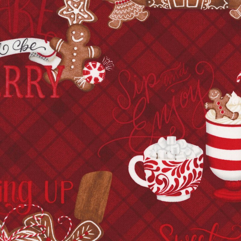 red fabric featuring gingerbread houses, cookies, hot cocoa and cozy phrases