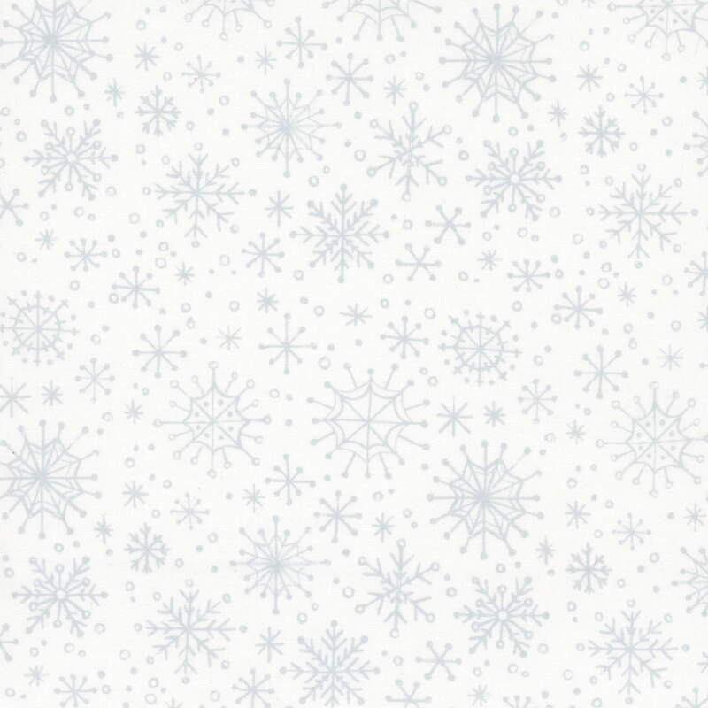 white fabric featuring silver snowflakes