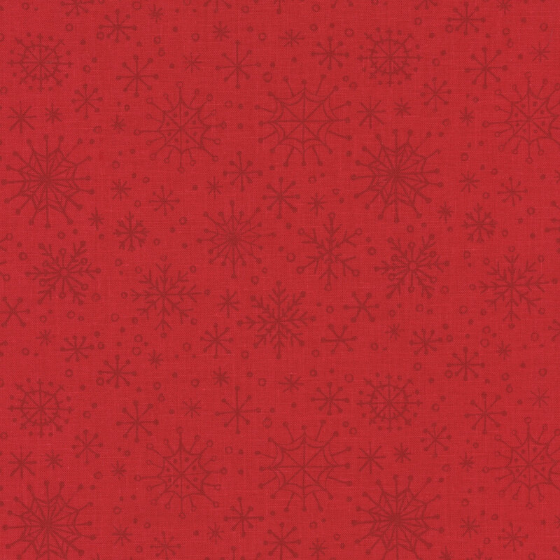 red fabric featuring lighter red snowflakes