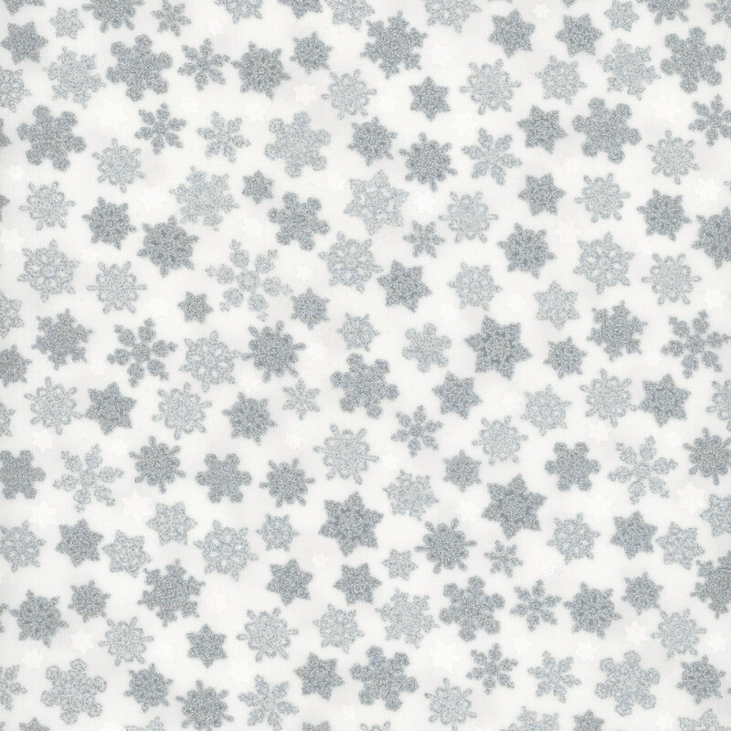 White fabric featuring  silver snow flakes