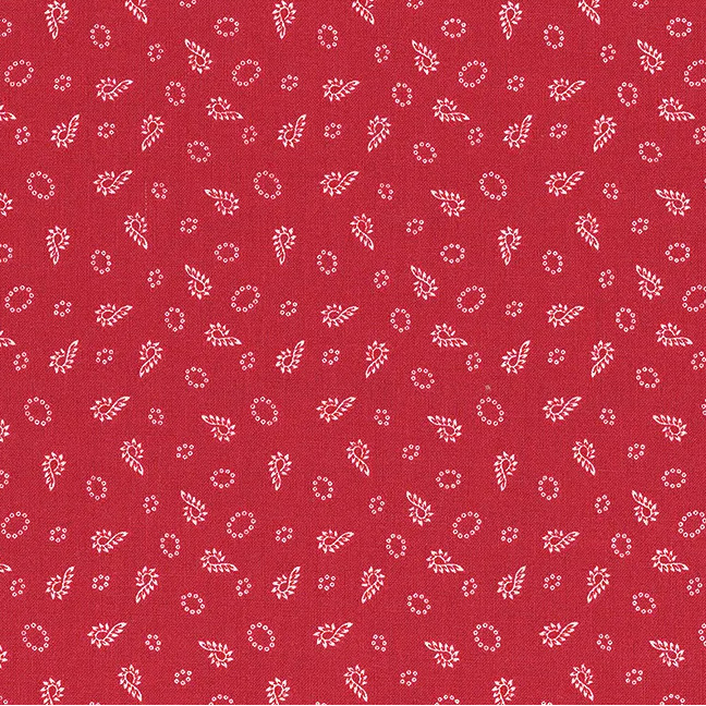 Tonal red fabric with a tossed candy cane pattern