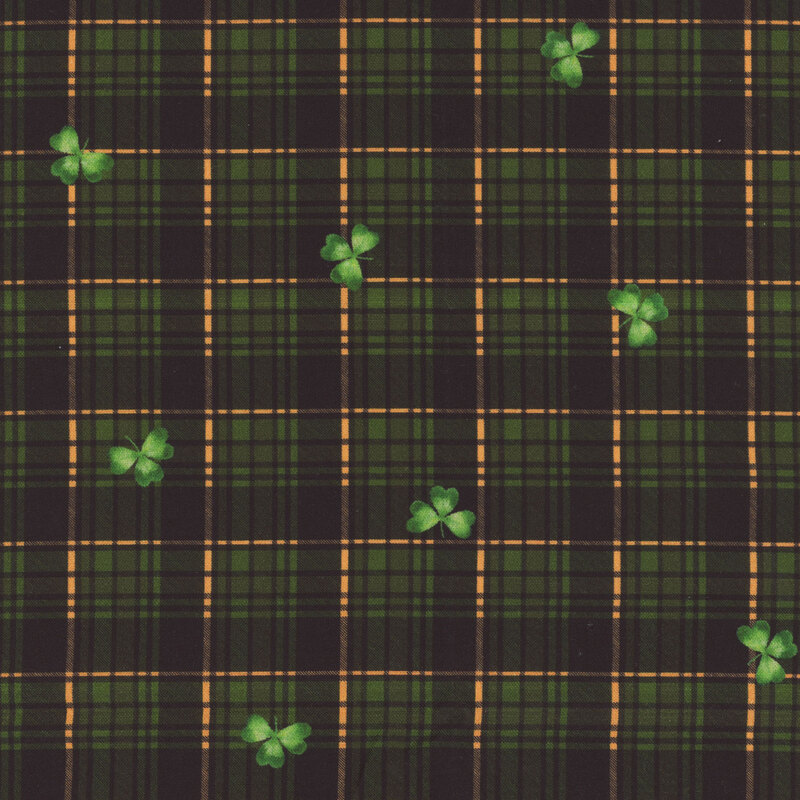 green and orange plaid fabric featuring shamrocks