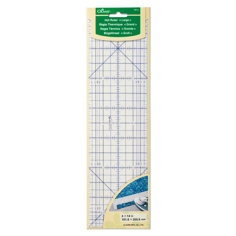 Clear quilting ruler with grid lines and markings for precise measurements and cuts.