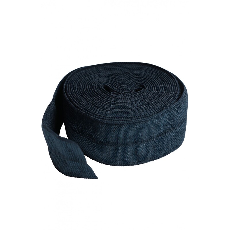 A circular roll of navy elastic, 3/4