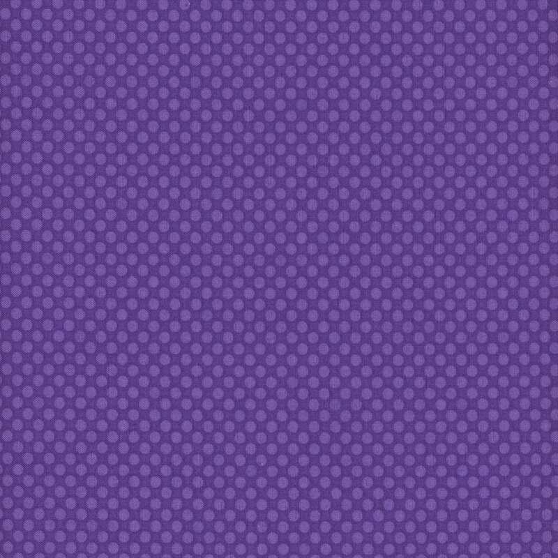 Purple tonal polka dots on orange