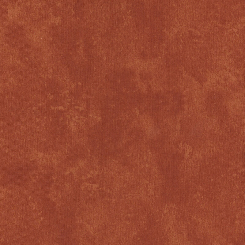 A textured fabric background in warm reddish-brown tones.