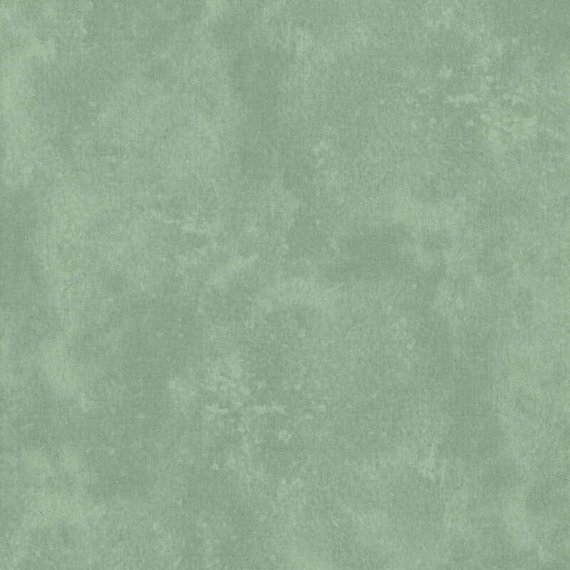 Muted teal green mottled fabric