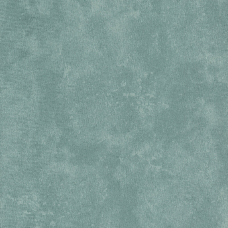 A muted teal mottled fabric