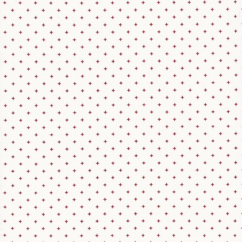 white fabric with tiny red crosses all over