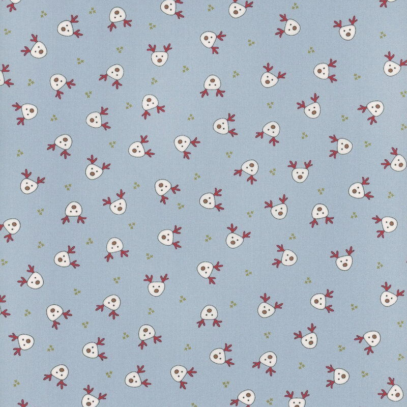 Light blue fabric with small white illustrated reindeer heads evenly spaced and tossed all over.