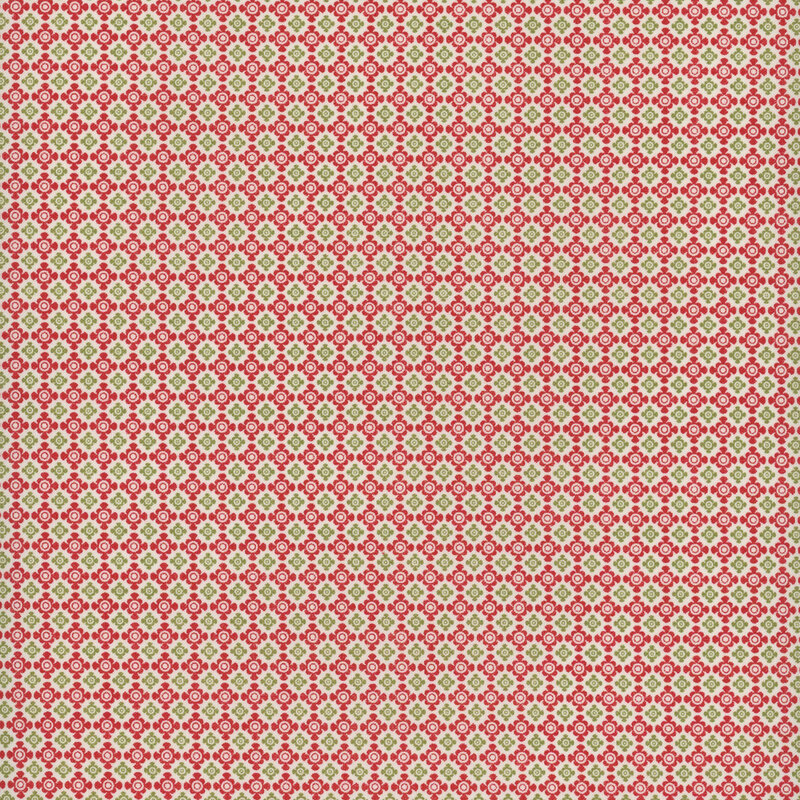 Green and red fabric with a visually interesting geometric pattern in a lattice-like pattern with rounded shapes against a cream background.