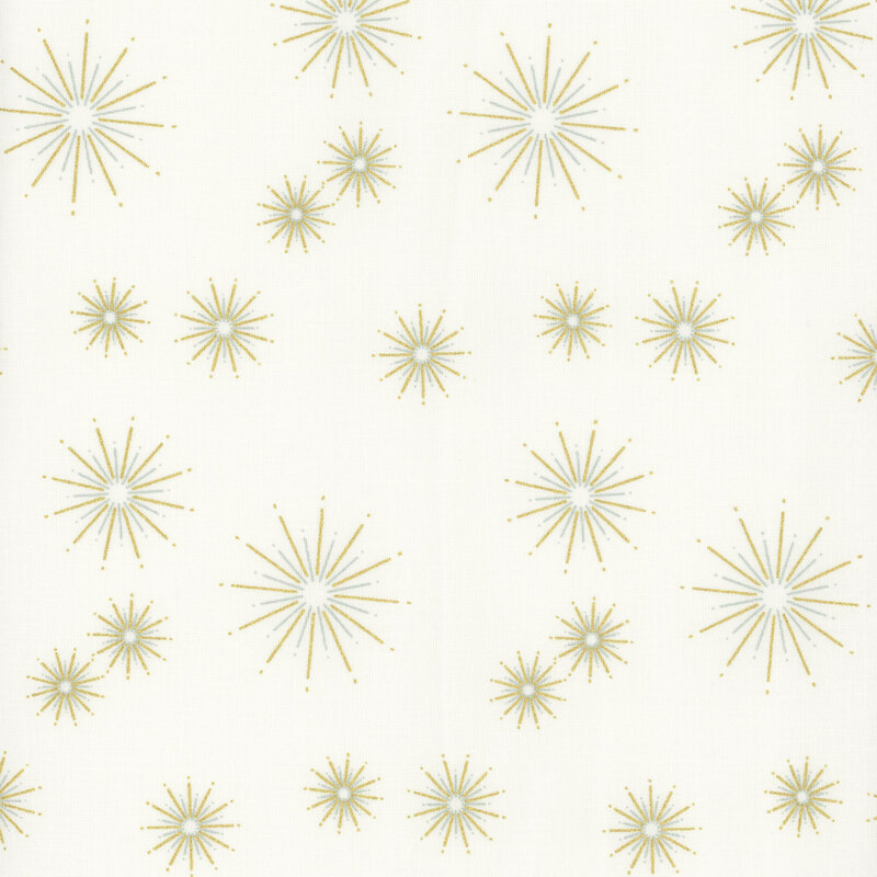 Cream fabric featuring gold metallic starbursts in varying sizes dotted all over.