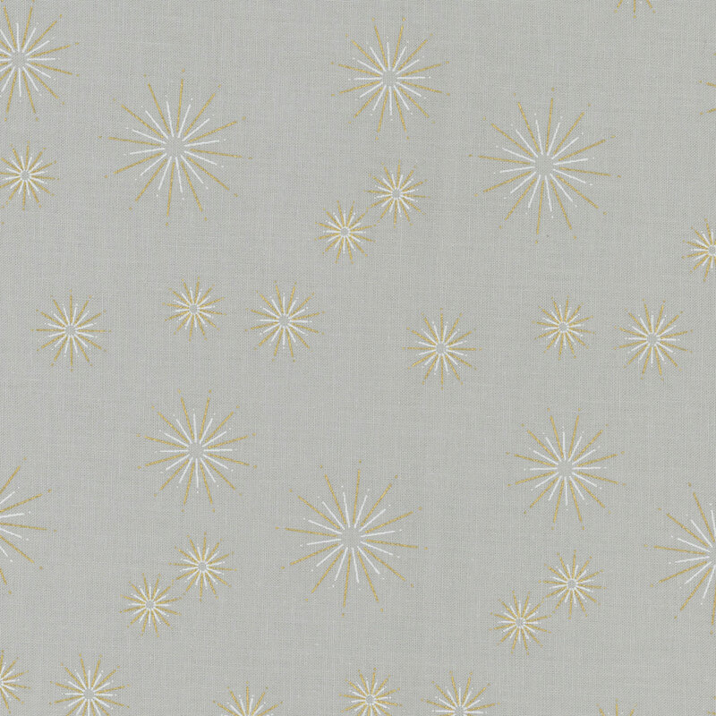 Light gray fabric featuring gold metallic starbursts in varying sizes dotted all over.