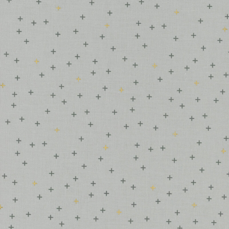 Simple light gray fabric featuring tiny gray and gold metallic crosses all over.