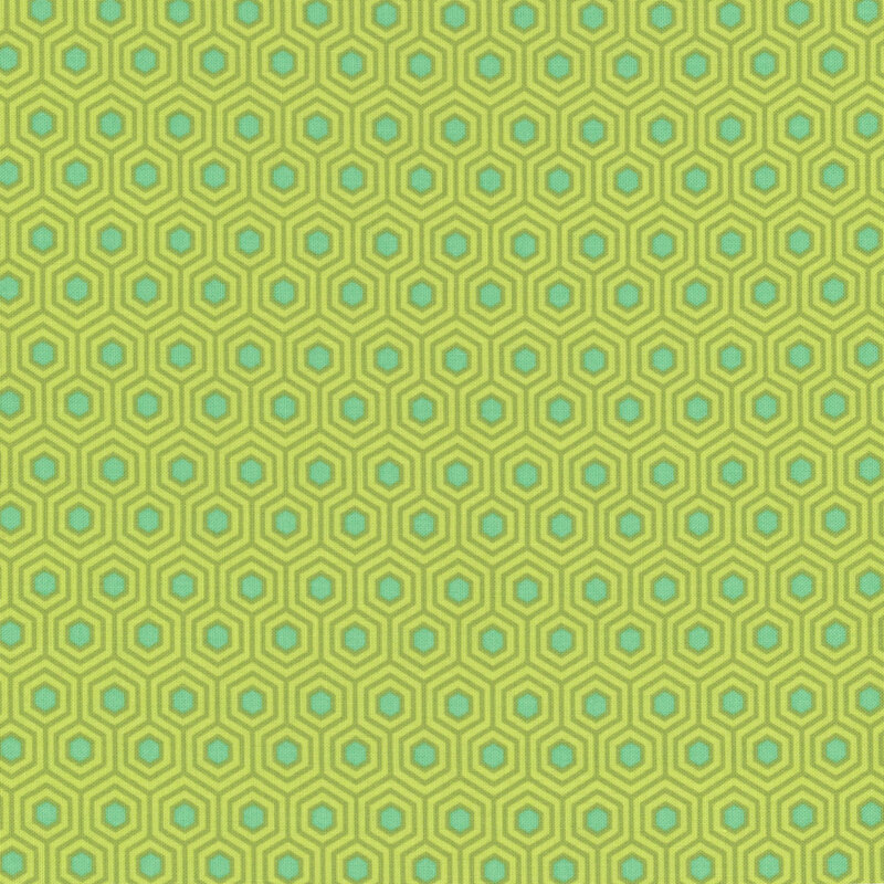 beautiful bright lime green fabric with darker green hexagonal honeycomb pattern, accented with a vivid teal center