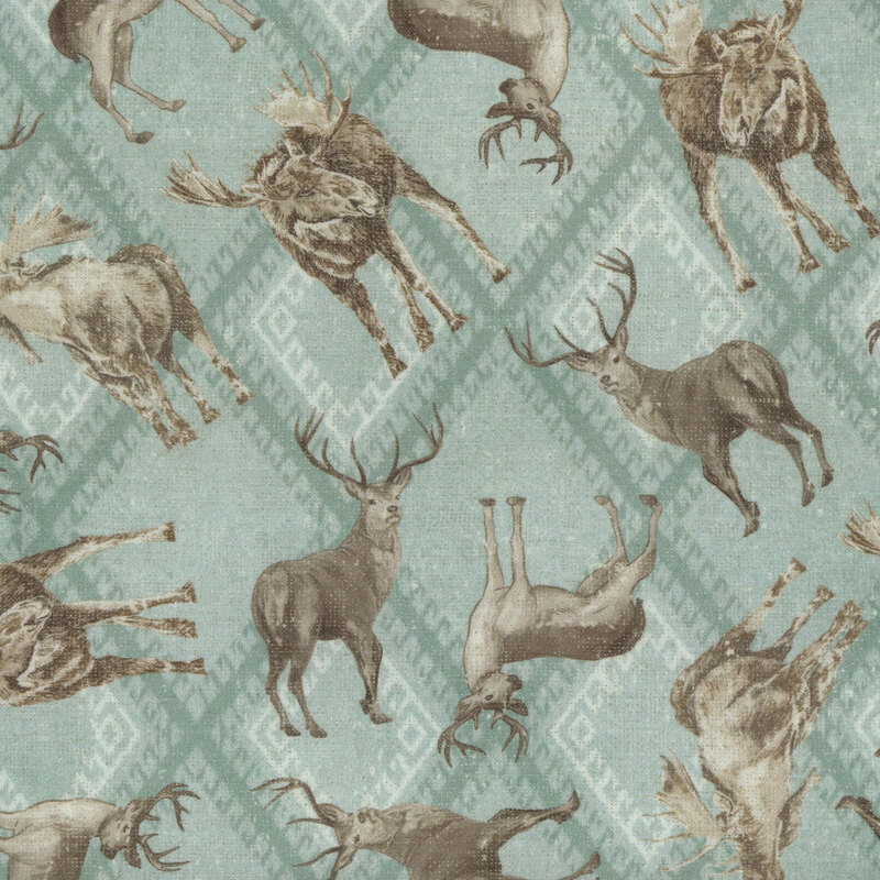 Blue fabric featuring a diamond pattern tossed with moose and deer