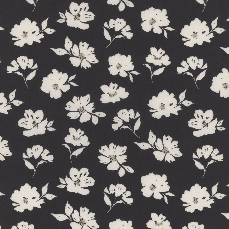 Black fabric patterned with small white florals with gray accents.