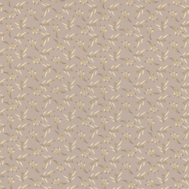 Taupe fabric patterned with small cream-colored leaflets.