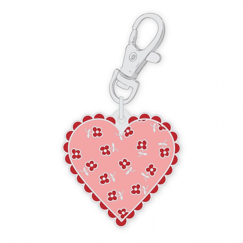 Digital mockup of the enamel pin with a clip: a pink heart with a red scalloped border that has lots of texture and tiny details.