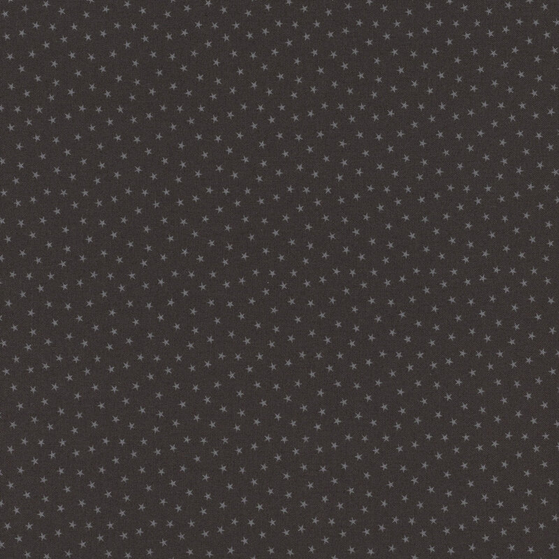 Black fabric with a pattern of tiny stars in a row